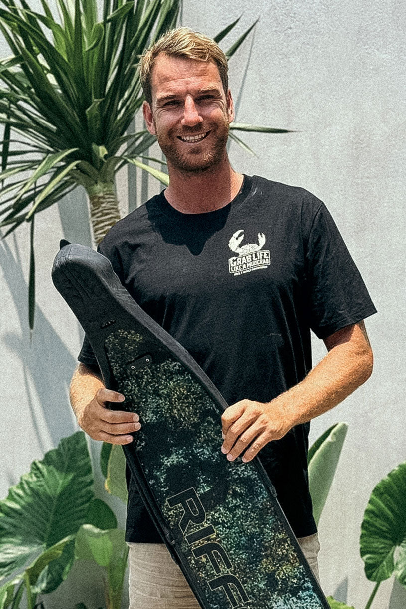 back 2 basics black graphic tee shirt with a grab life like a mud crab print on the front