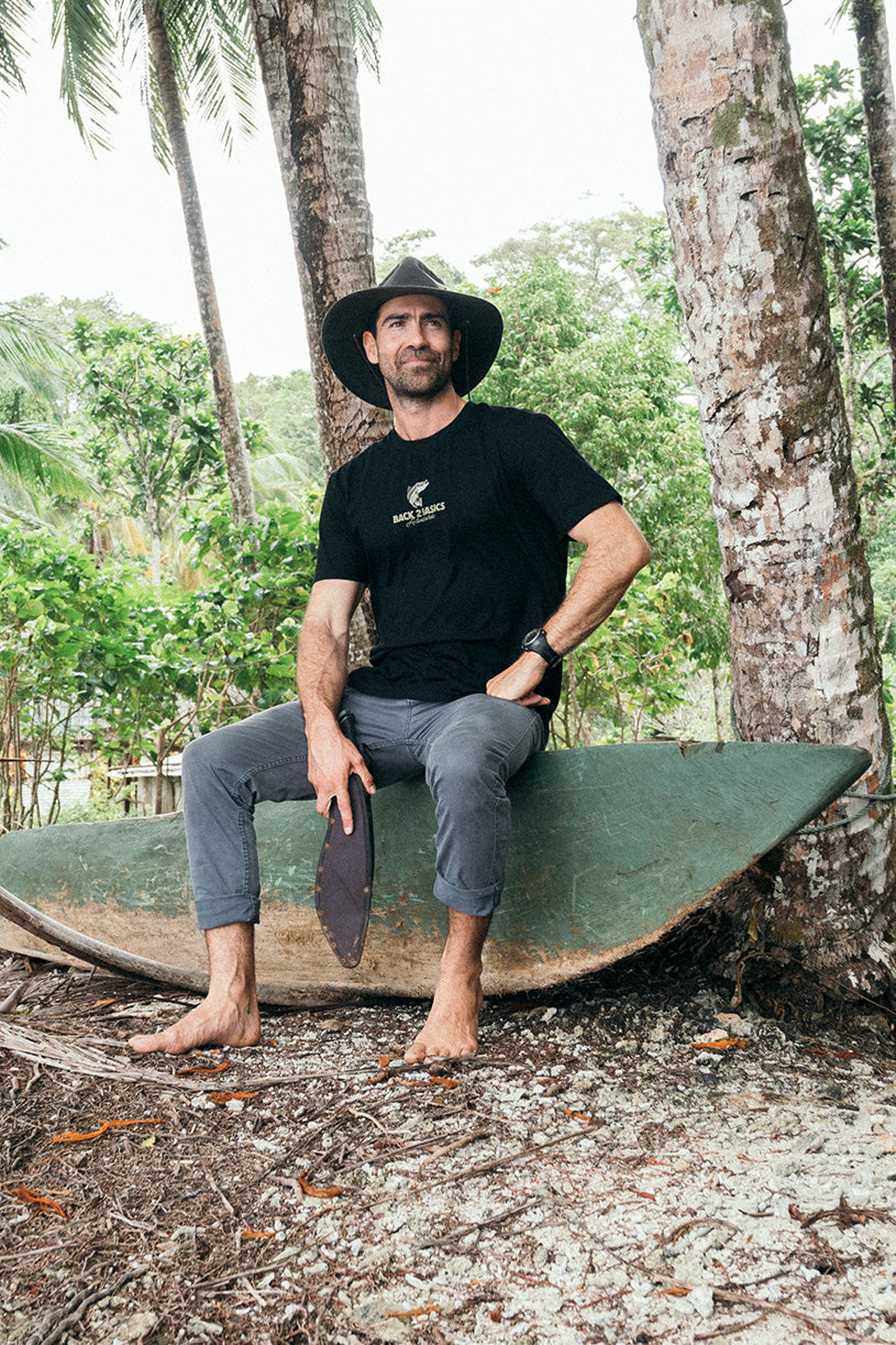 aaron from back 2 basics wearing a black tee shirt with a barramundi on it